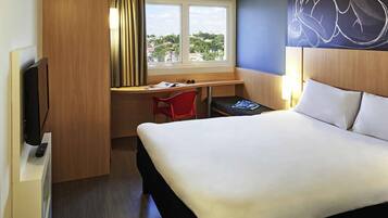 1 slaapkamer, een minibar, verduisterende gordijnen, geluiddichte muren