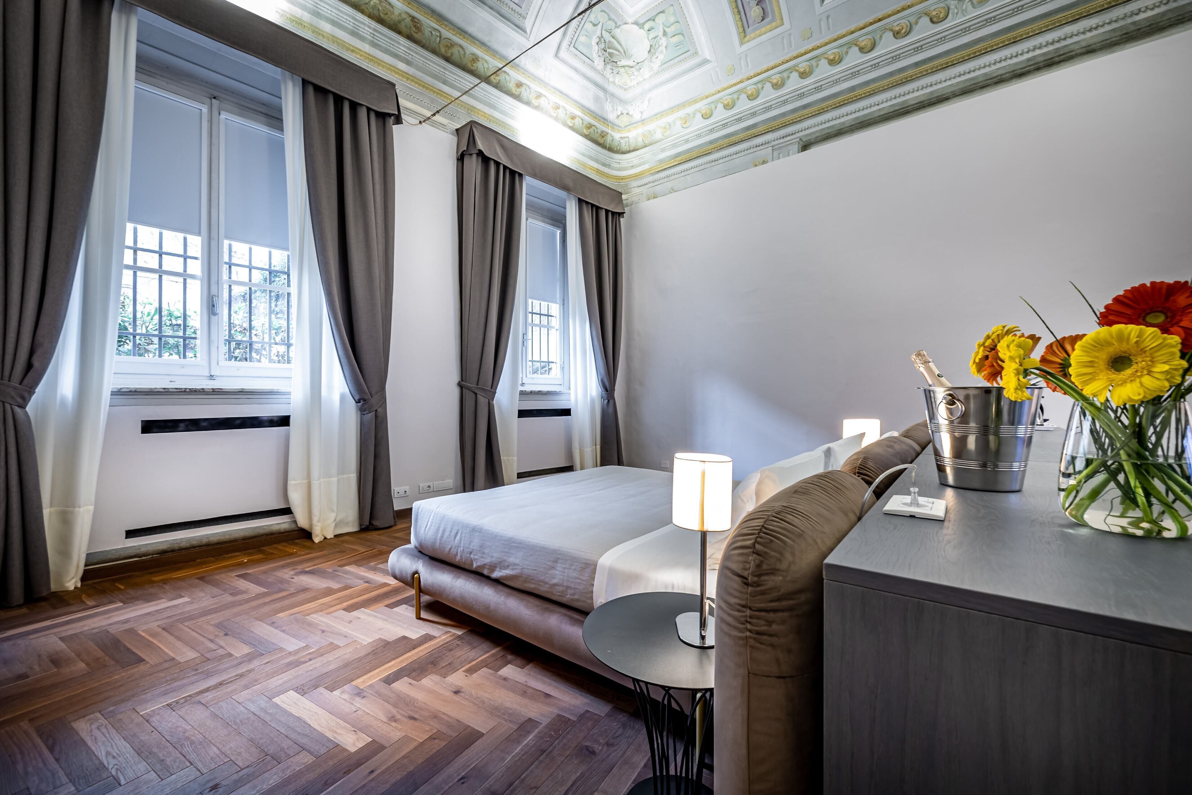 Donzen dekbedden, bedden met traagschuimmatras, een minibar