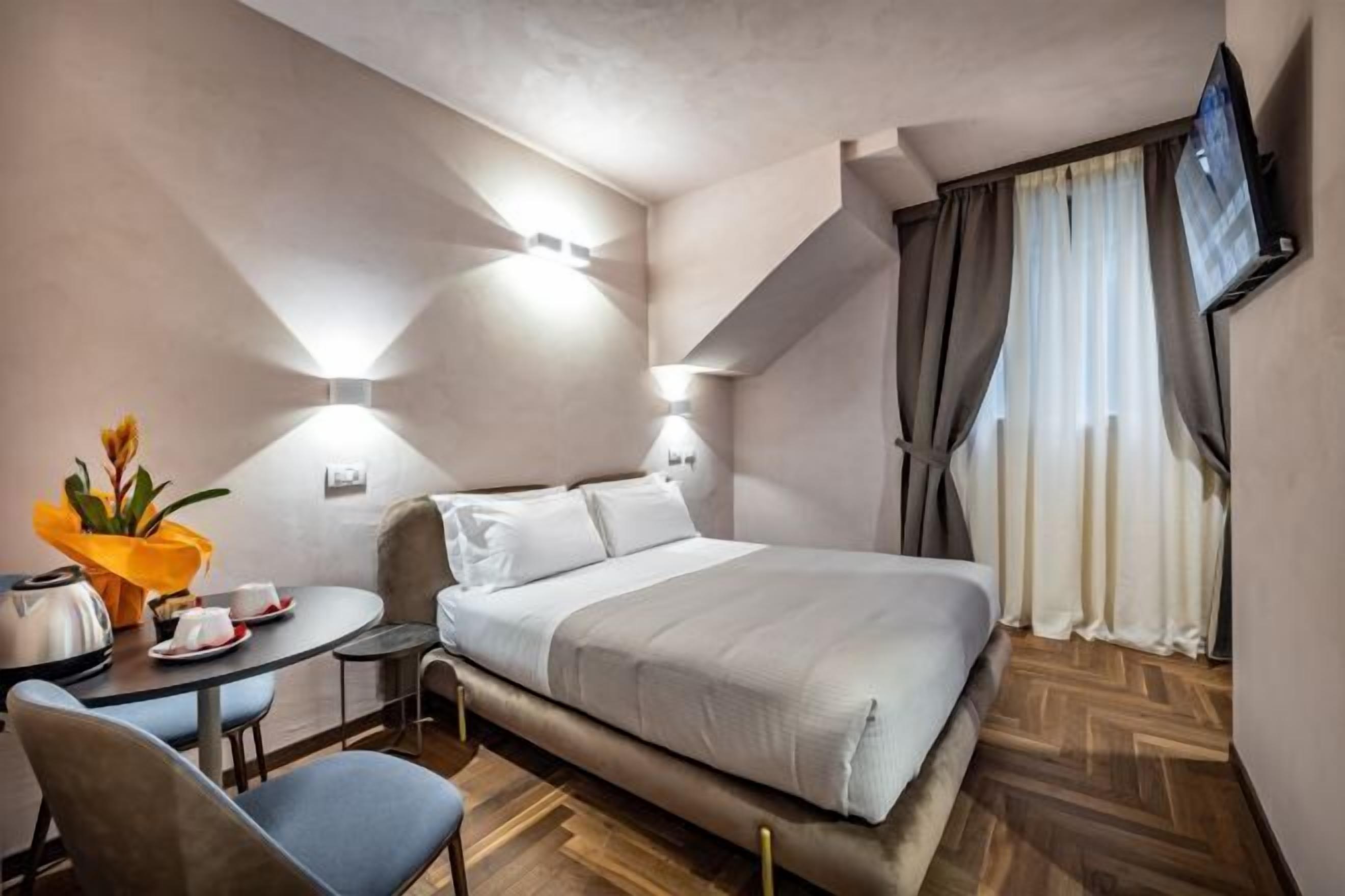 Down comforters, memory foam beds, minibar, in-room safe