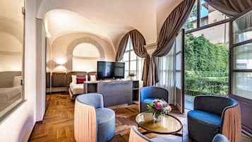 Habitación doble Deluxe, vista al jardín | 1 habitación, edredón, camas con efecto memoria y minibar