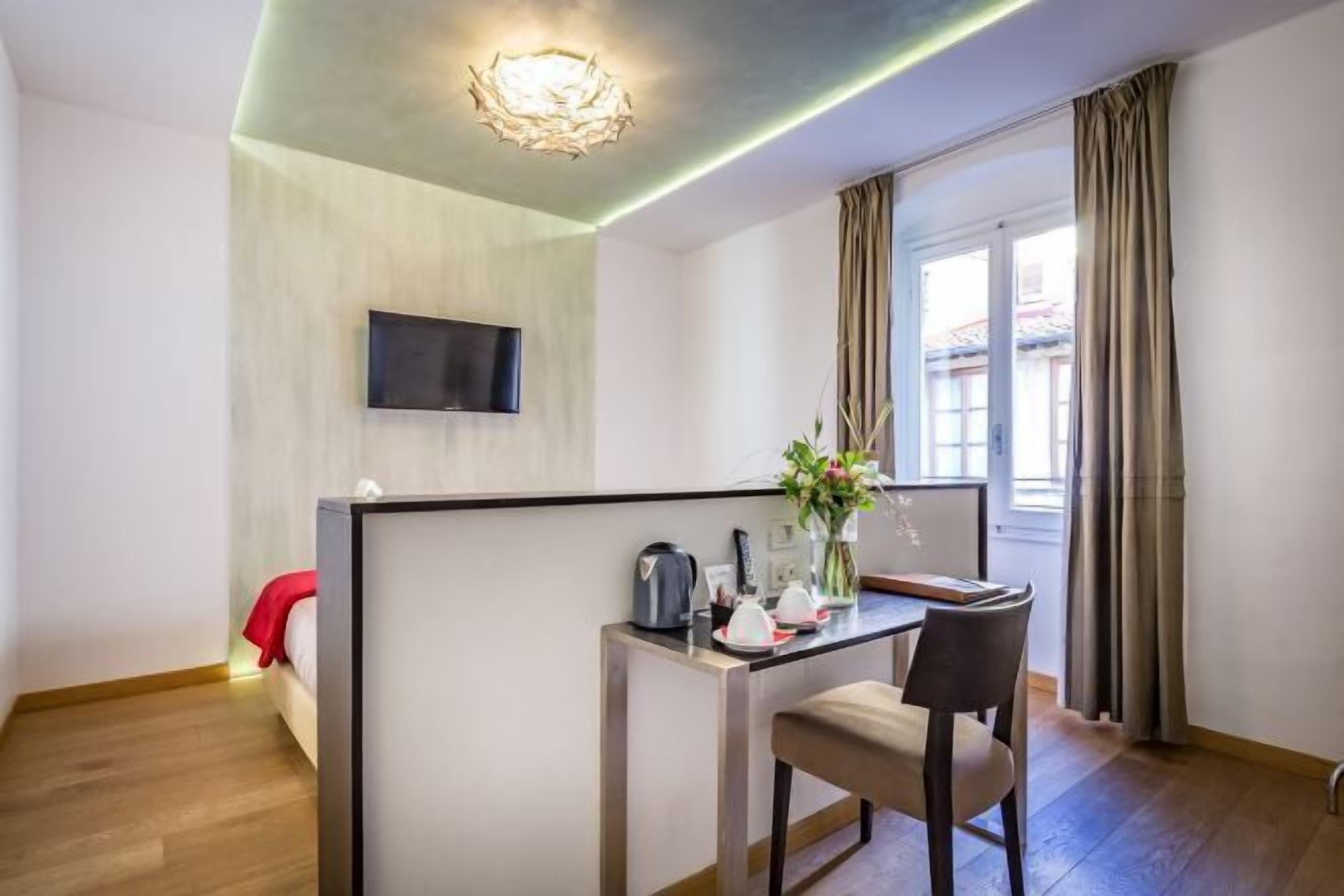 Down comforters, memory foam beds, minibar, in-room safe