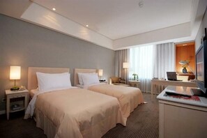 Premium bedding, down duvets, in-room safe, desk