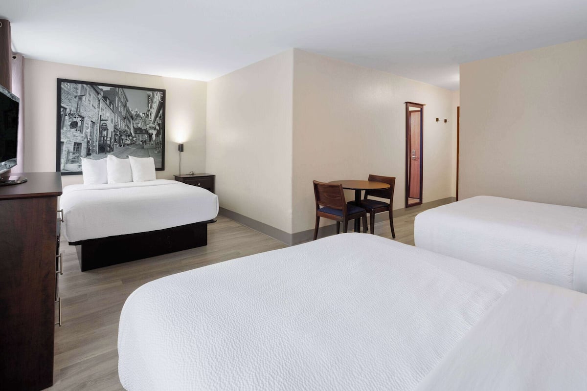 Room, Non Smoking (3 Queen beds) | Desk, blackout curtains, iron/ironing board, free WiFi