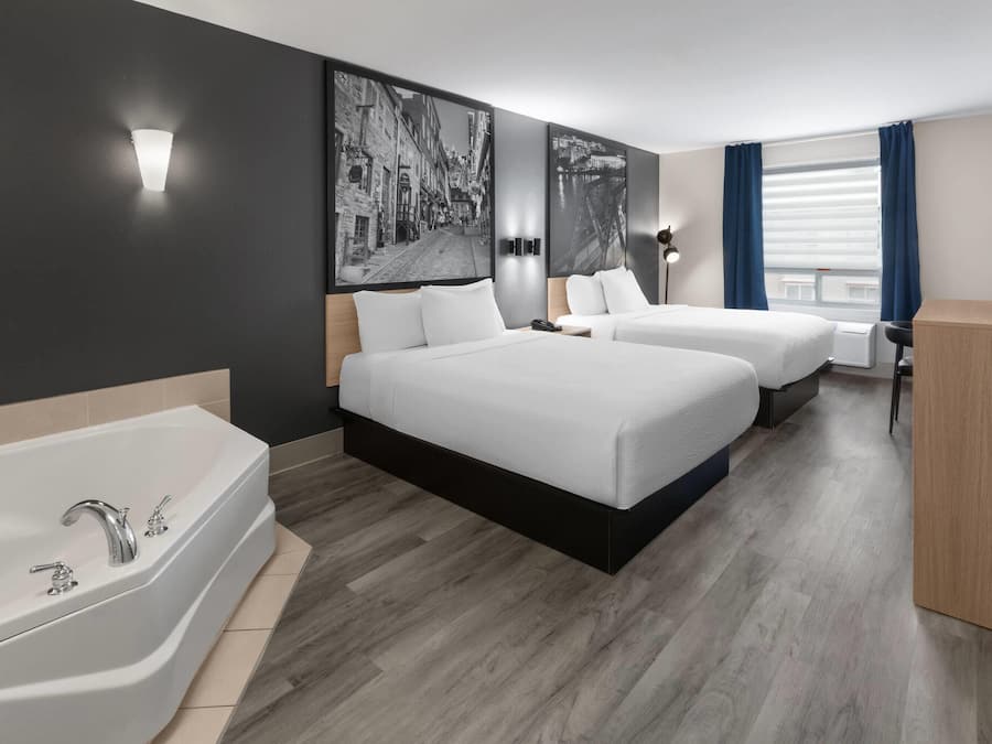 Suite, 2 Queen Beds, Non Smoking | Jetted tub