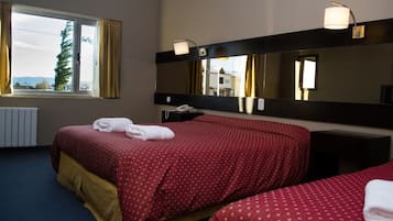 Triple Room | Hypo-allergenic bedding, in-room safe, desk, blackout curtains