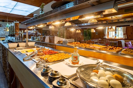 Daily buffet breakfast (EUR 18 per person)
