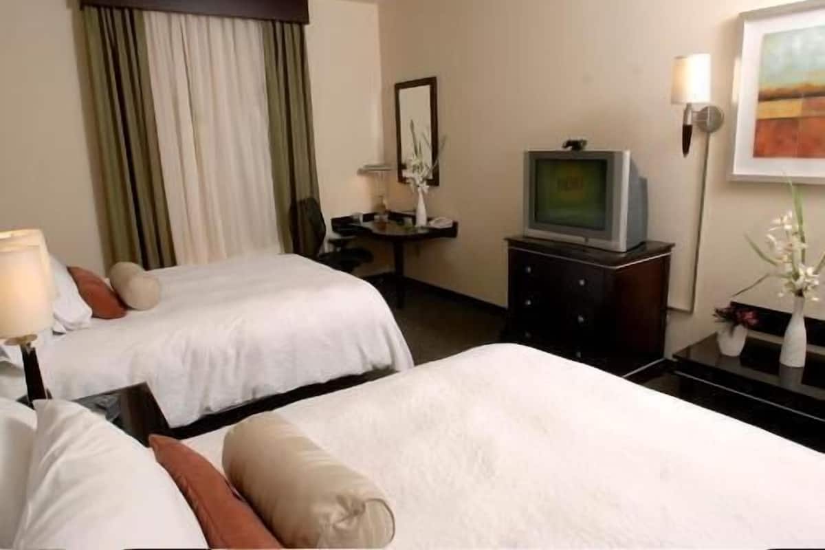 Premium bedding, pillowtop beds, desk, laptop workspace