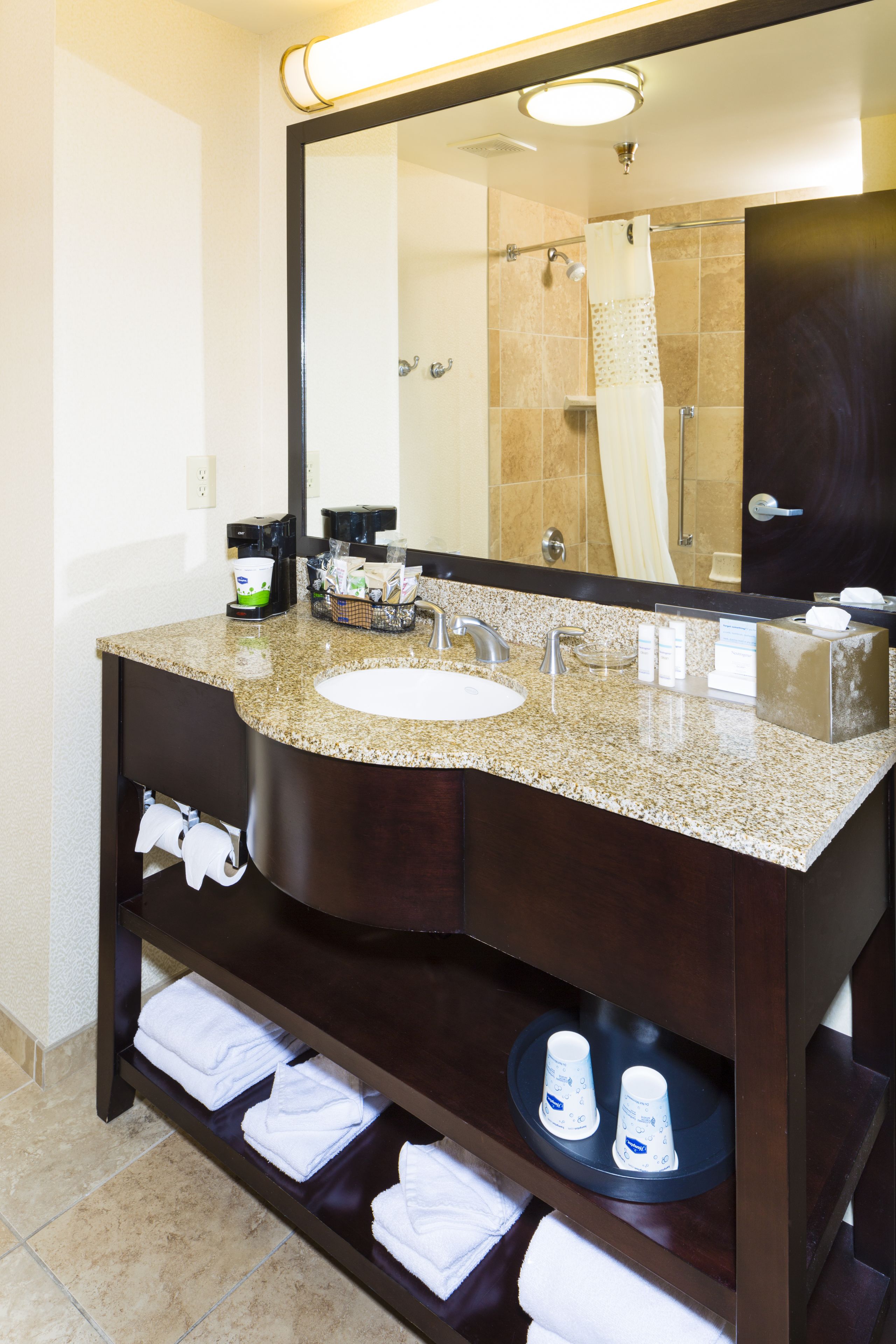 two queens | bathroom | combined shower/bathtub, designer toiletries, hair dryer, towels
