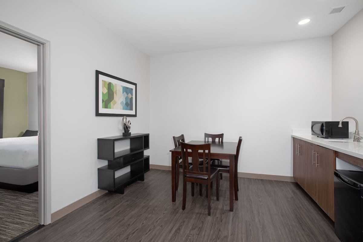Desk, laptop workspace, blackout curtains, iron/ironing board