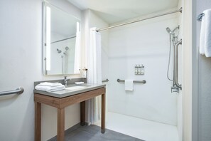 Combined shower/tub, hair dryer, towels, soap