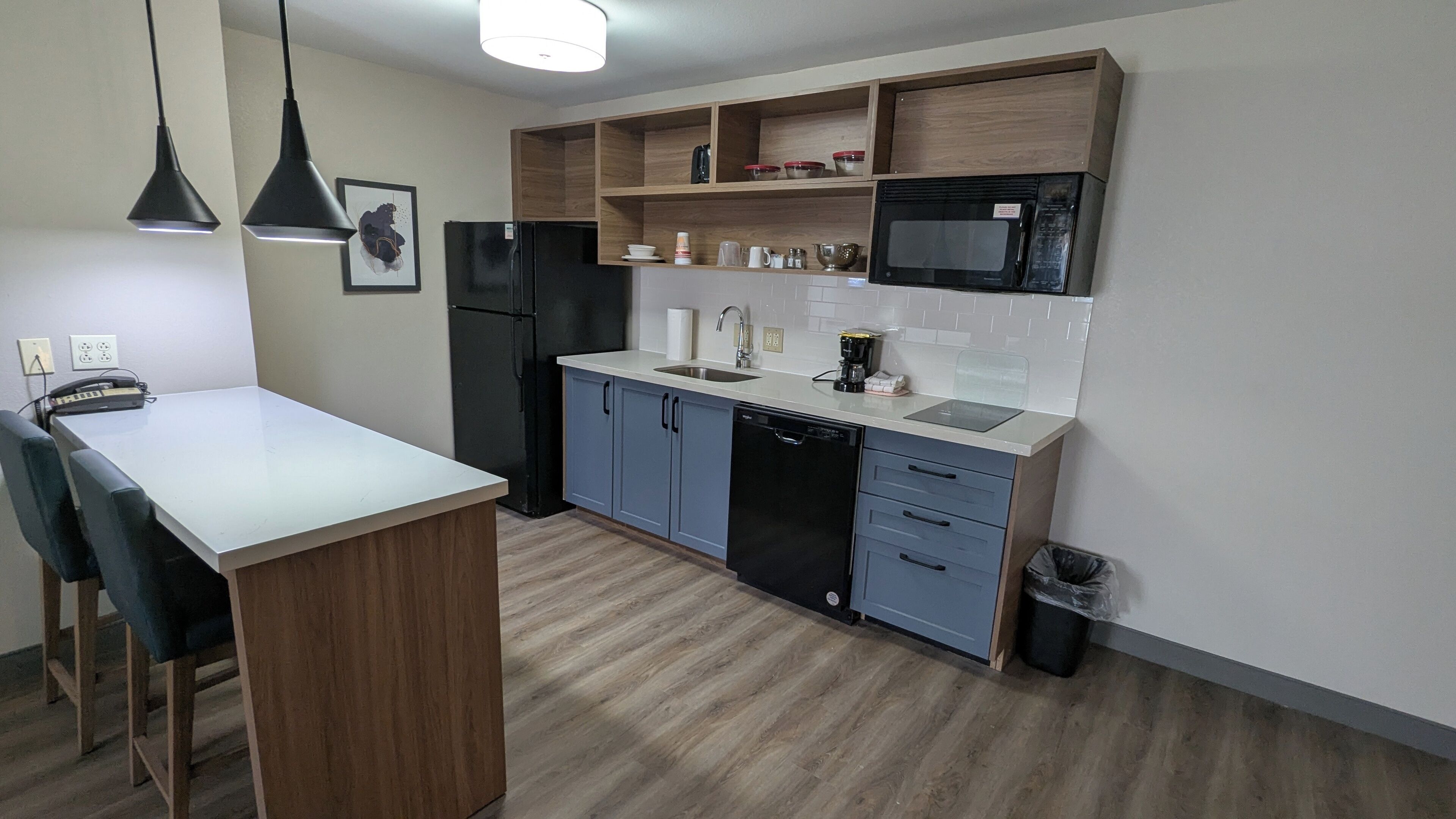 suite, 1 bedroom | private kitchen | full-sized fridge, microwave, stovetop, dishwasher