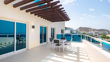 Grand Suite, Balcony, Ocean View | Premium bedding, minibar, in-room safe, desk