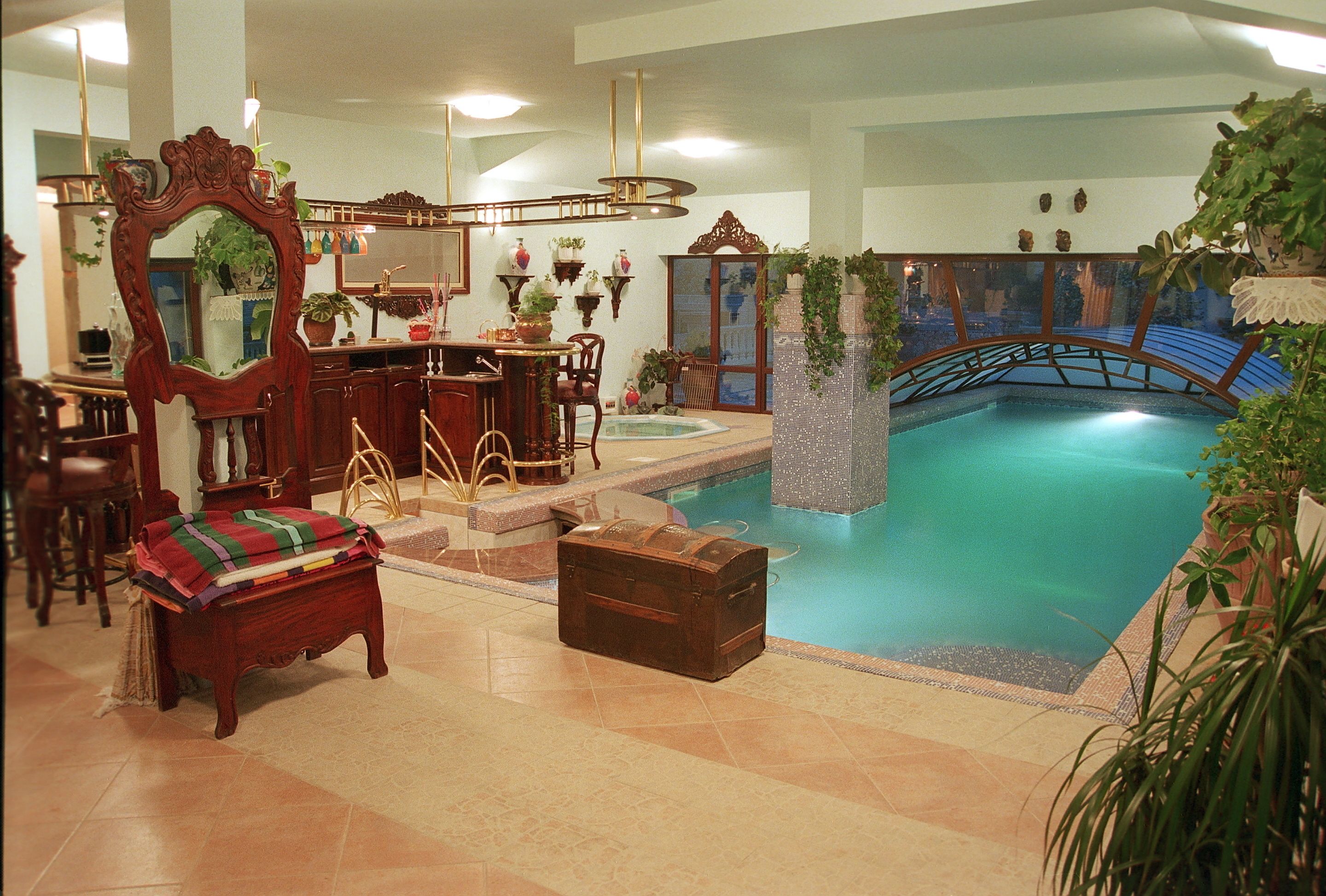 seasonal outdoor pool, pool umbrellas, pool loungers