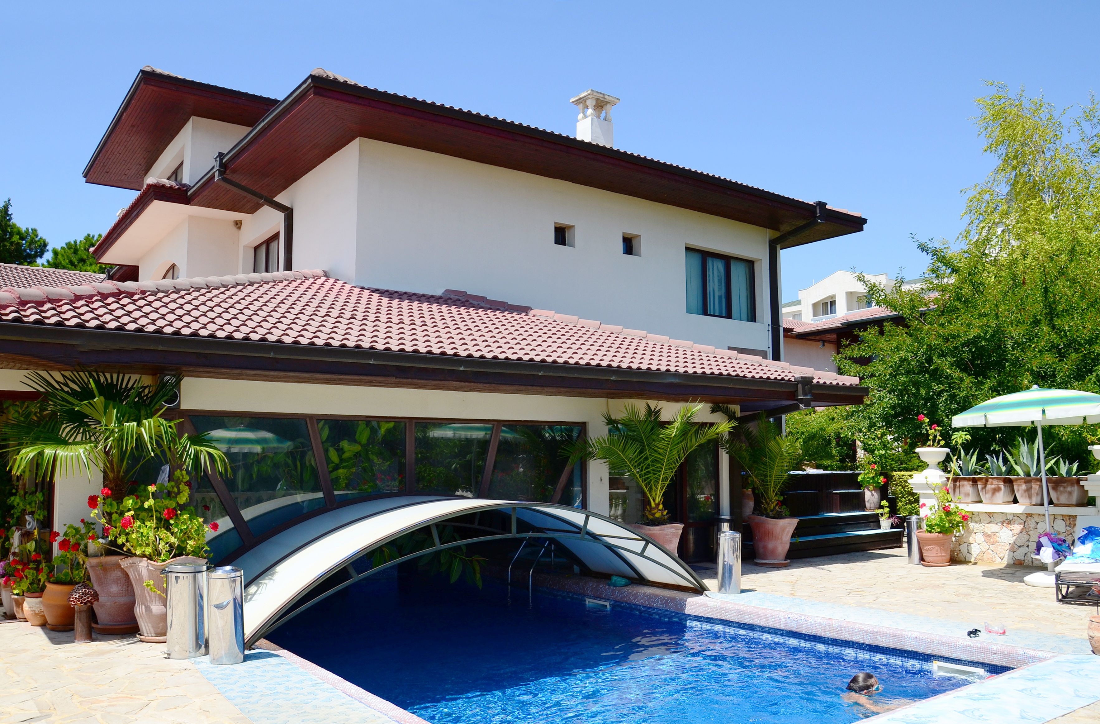 seasonal outdoor pool, pool umbrellas, pool loungers