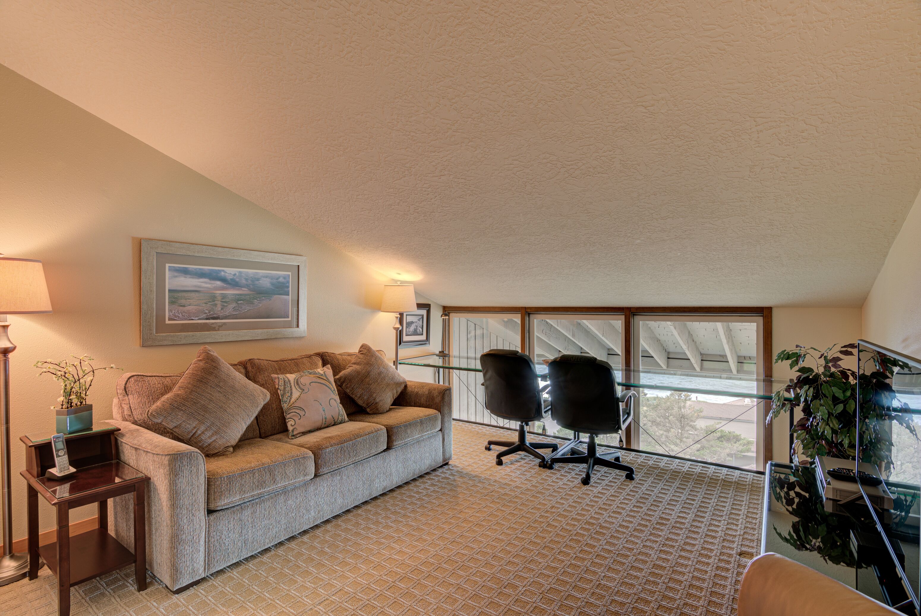 signature condo (la vista de la roca) | living area | tv, dvd player