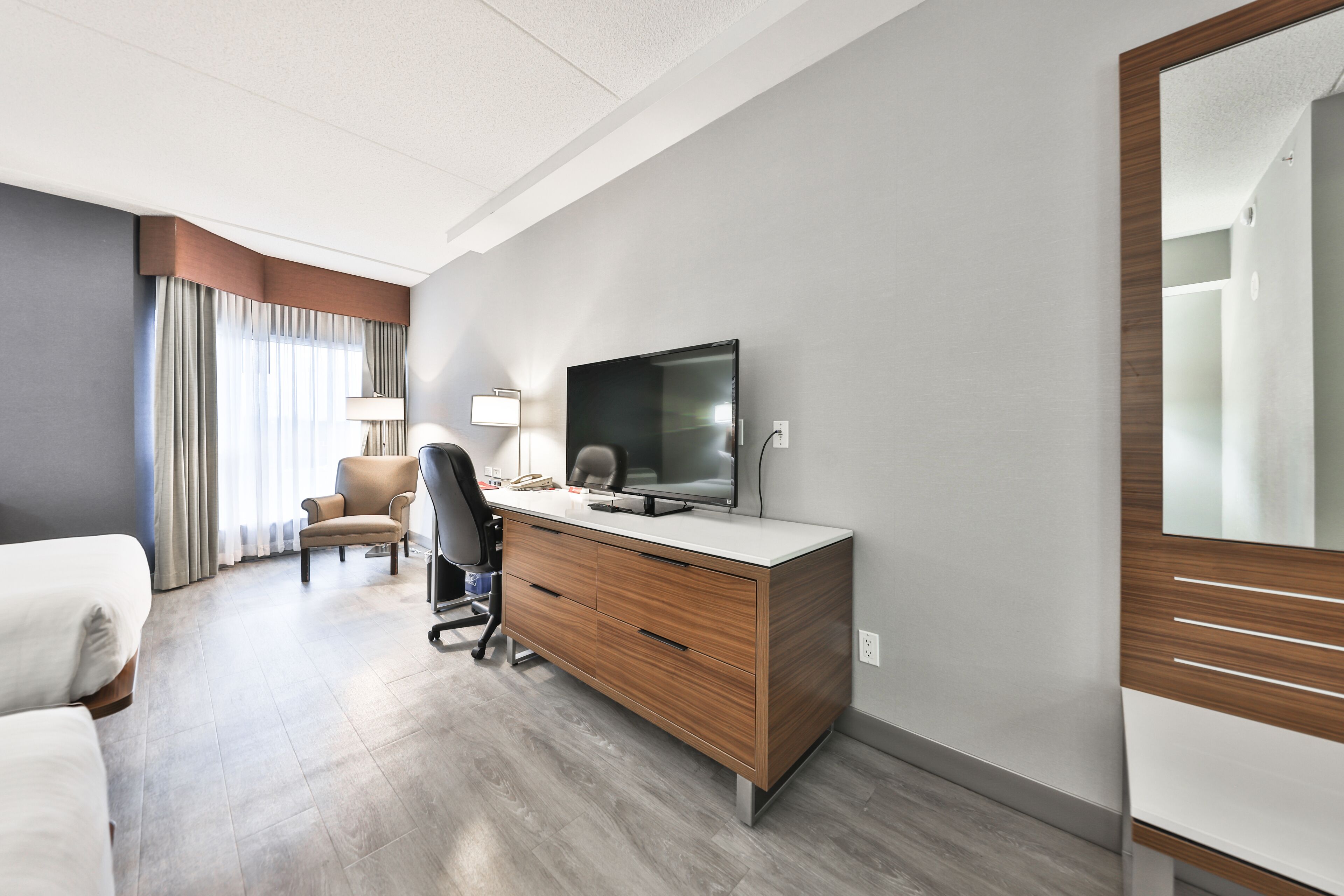 standard room, 2 queen beds | in-room safe, desk, iron/ironing board, cots/infant beds