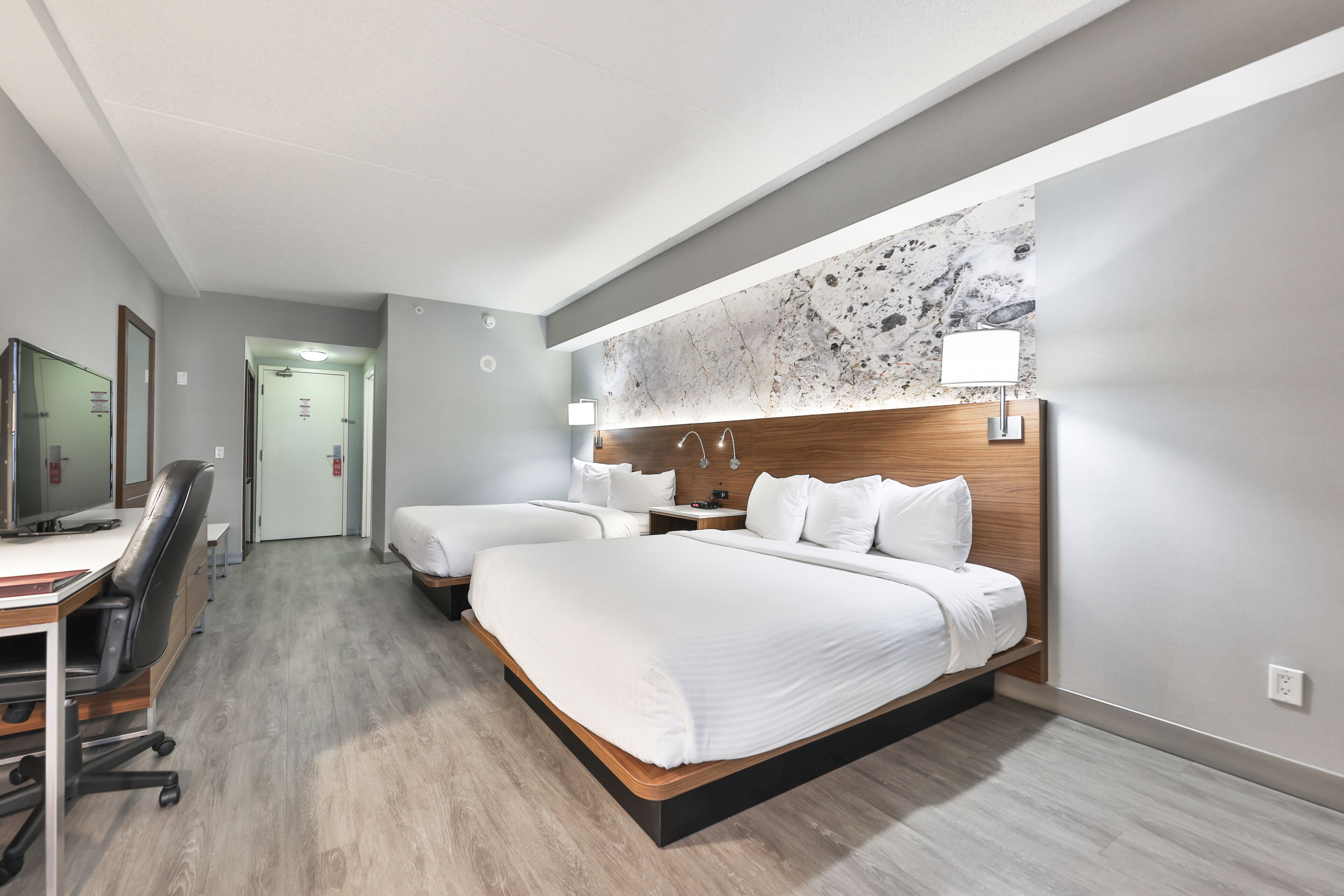 standard room, 2 queen beds | in-room safe, desk, iron/ironing board, cots/infant beds