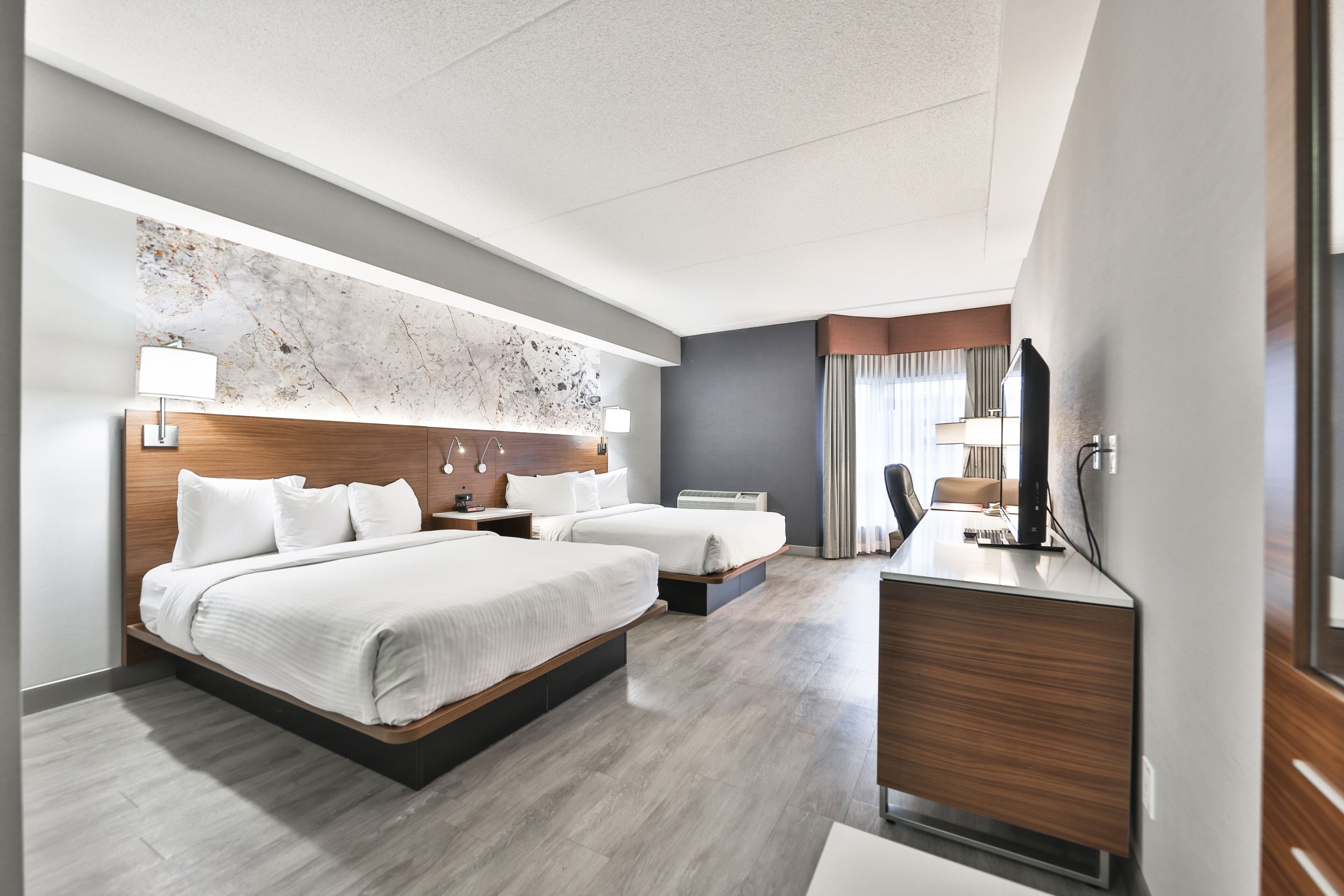 standard room, 2 queen beds | in-room safe, desk, iron/ironing board, cots/infant beds