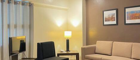 Premier Suite, 1 Bedroom, City View | Living area | LCD TV