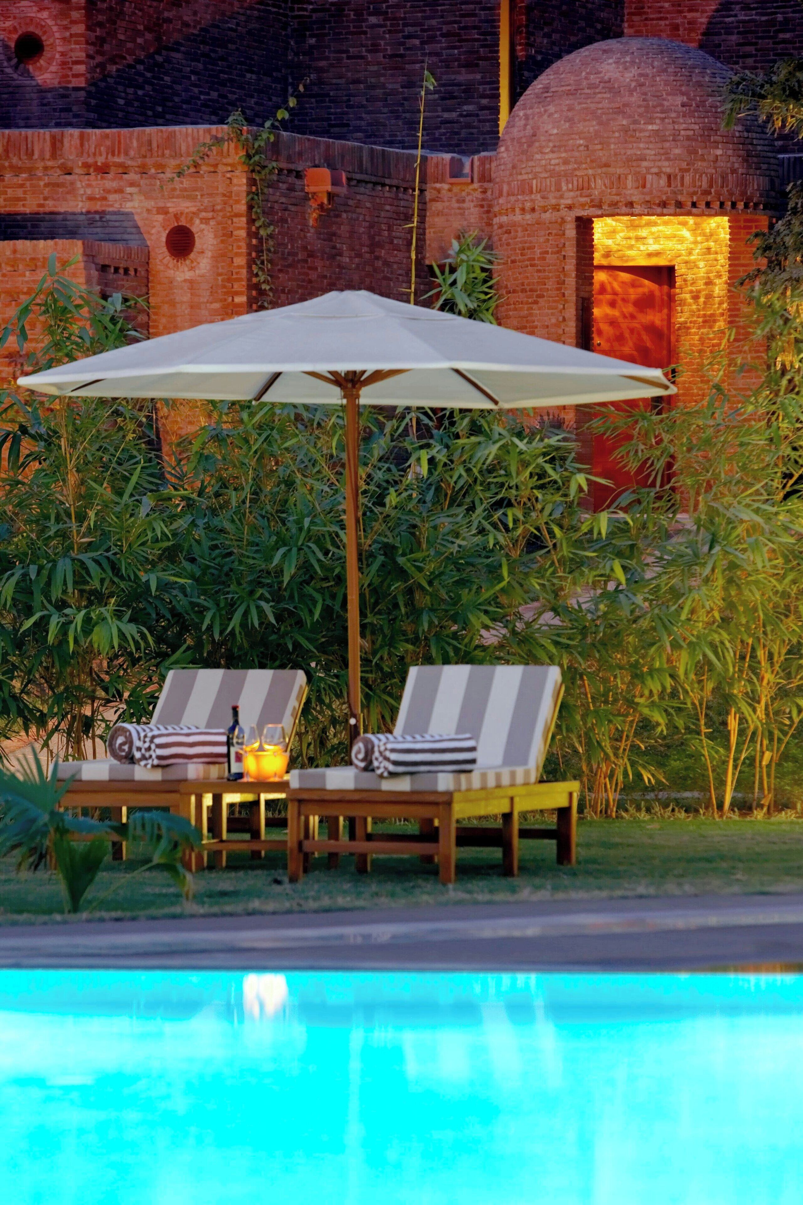 2 outdoor pools, open 7:00 am to 8:00 pm, pool umbrellas, pool loungers