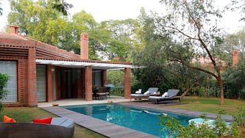 2 outdoor pools, open 7:00 AM to 8:00 PM, pool umbrellas, pool loungers