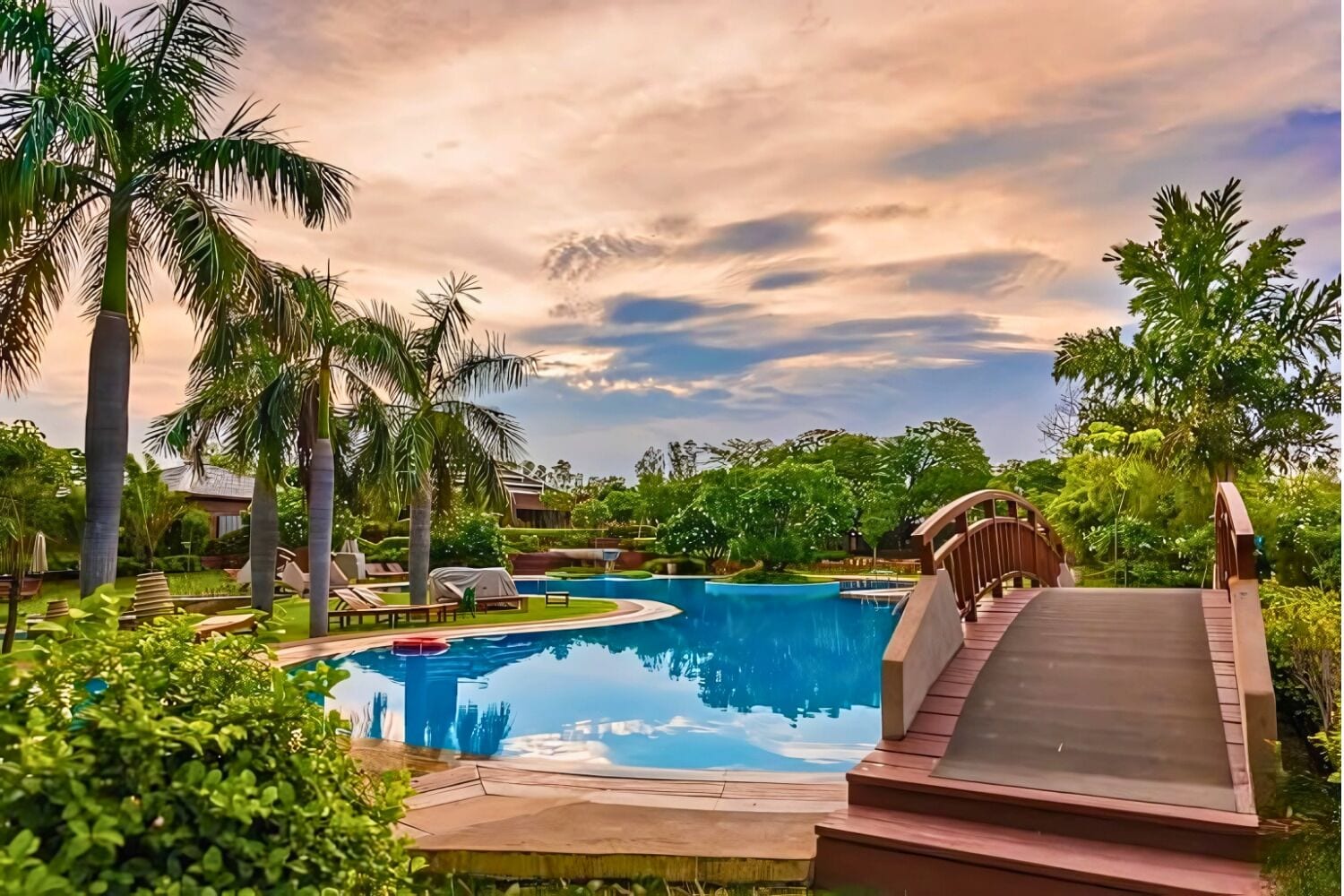 2 outdoor pools, open 7:00 AM to 8:00 PM, pool umbrellas, pool loungers