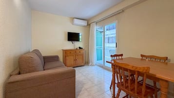 32-inch flat-screen TV with satellite channels, TV