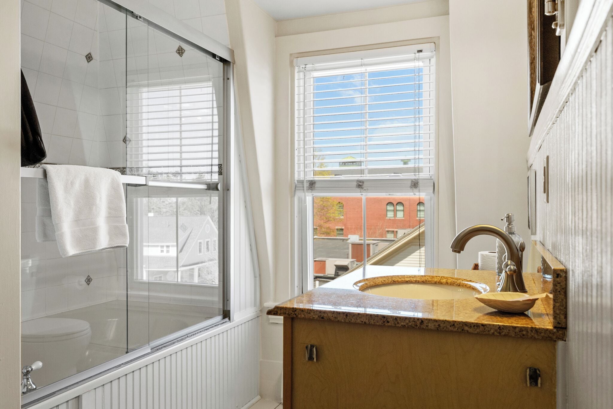 superior bedroom | bathroom | designer toiletries, hair dryer, bathrobes, towels