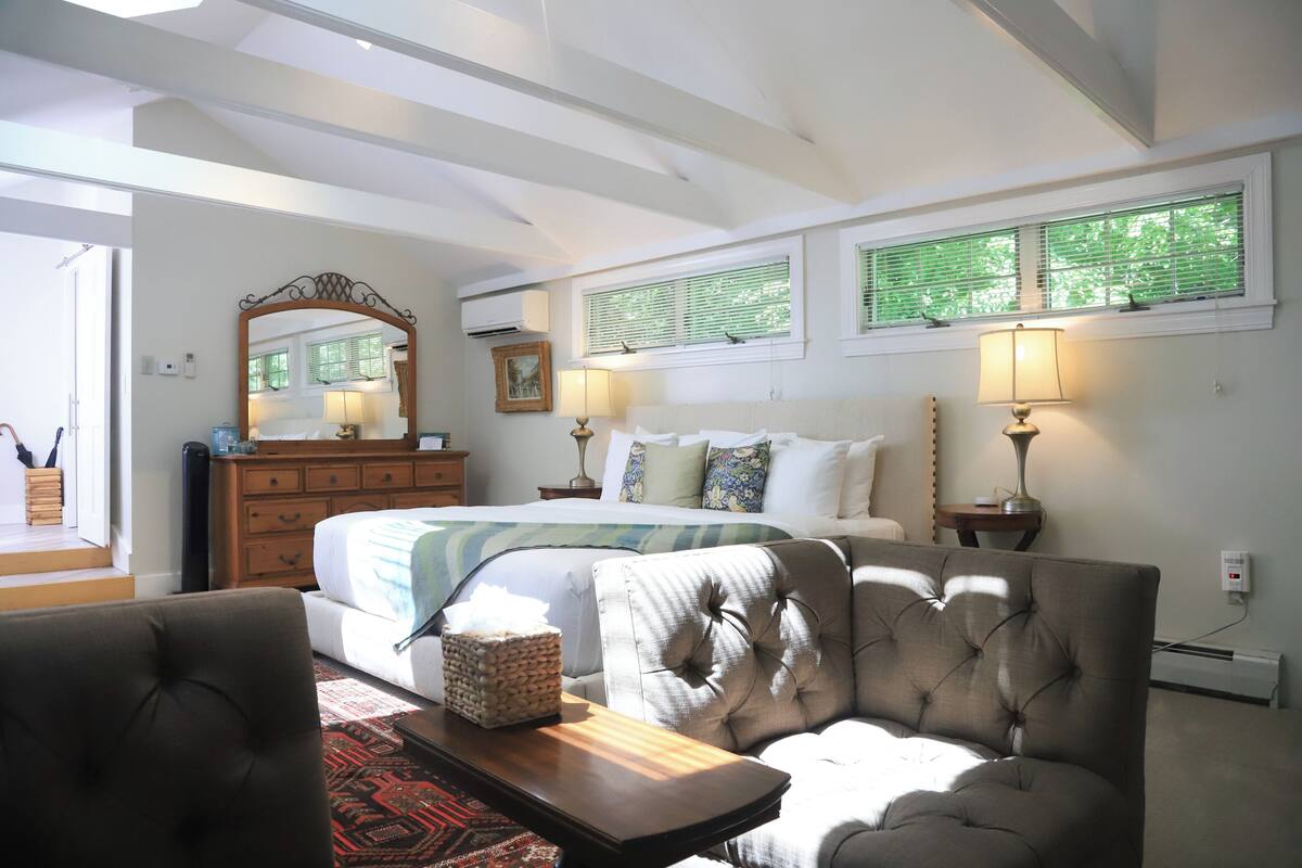 deluxe king suite | egyptian cotton sheets, premium bedding, memory-foam beds