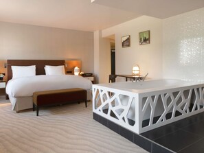 Premium bedding, memory-foam beds, free minibar items, in-room safe