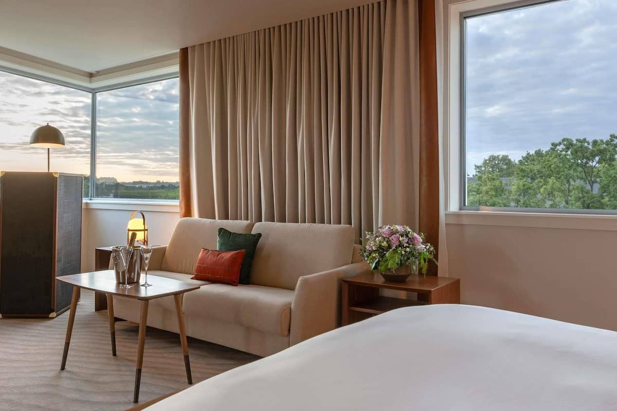 Premium bedding, memory-foam beds, free minibar items, in-room safe