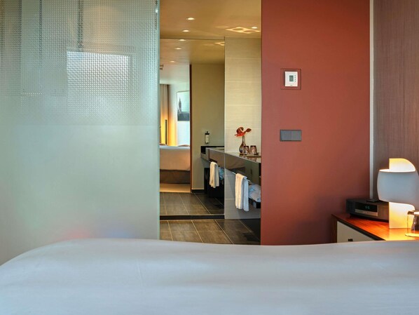 Premium bedding, memory-foam beds, free minibar items, in-room safe
