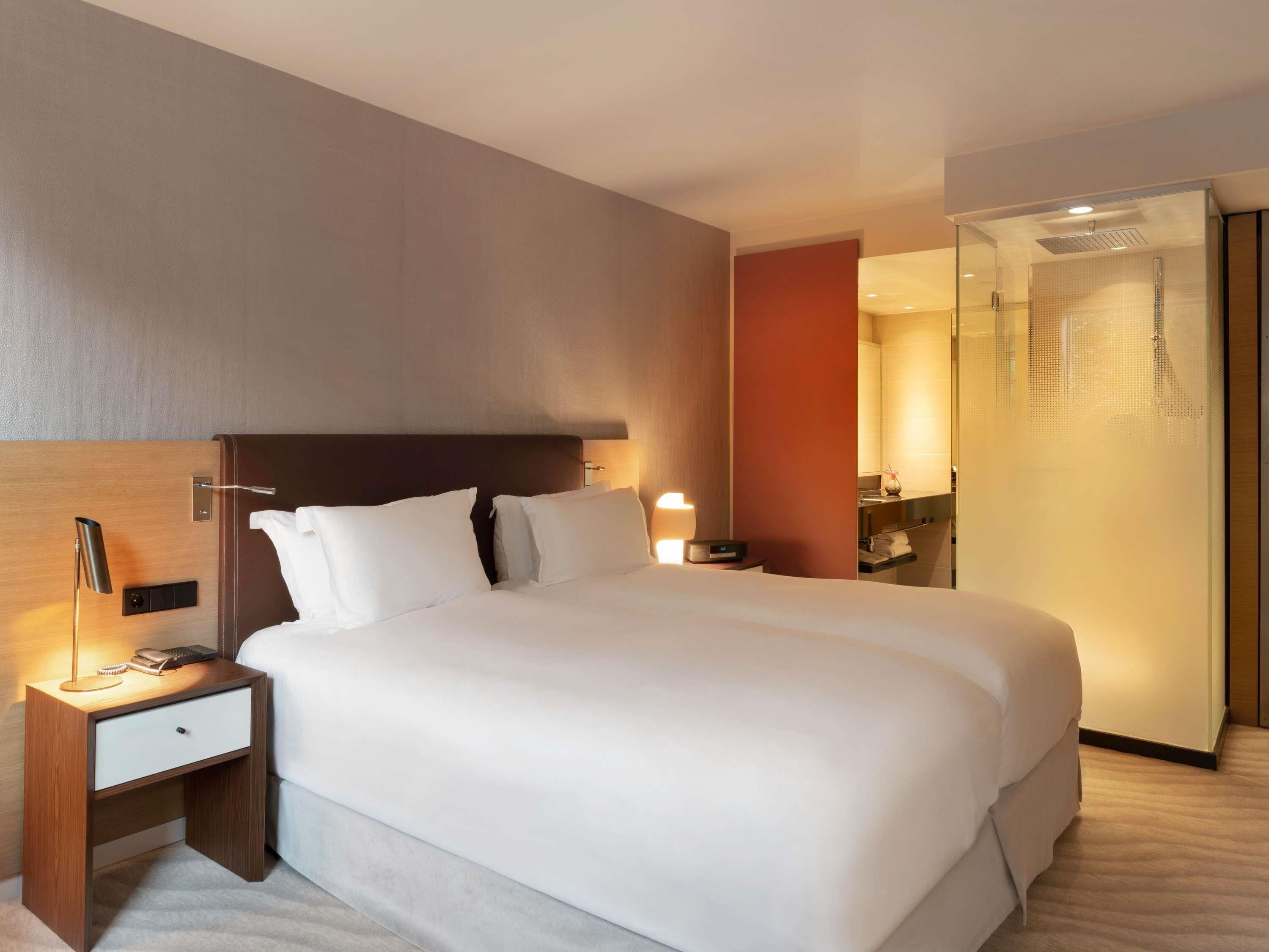 Premium bedding, memory foam beds, minibar (some free items)