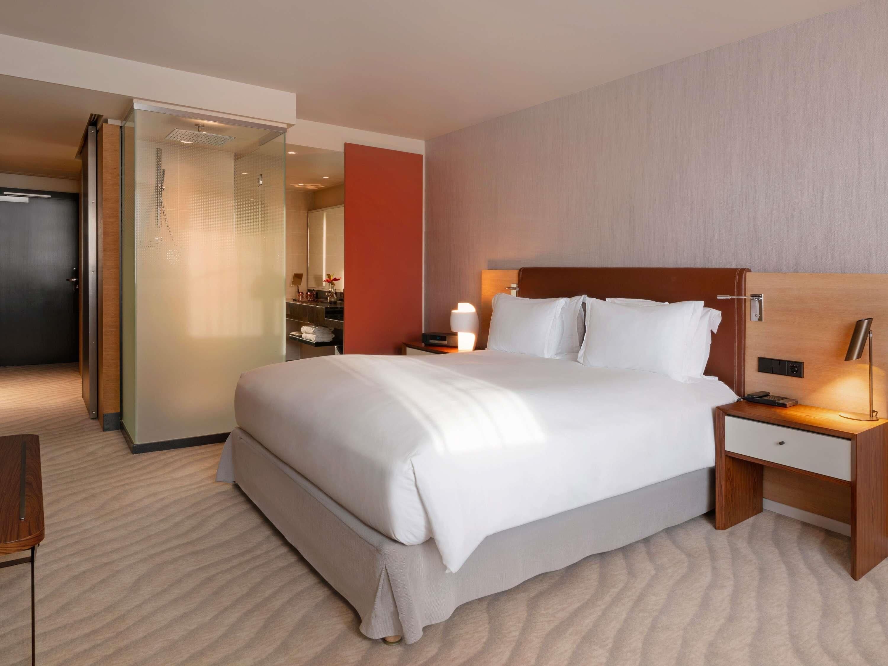 Premium bedding, memory-foam beds, free minibar items, in-room safe