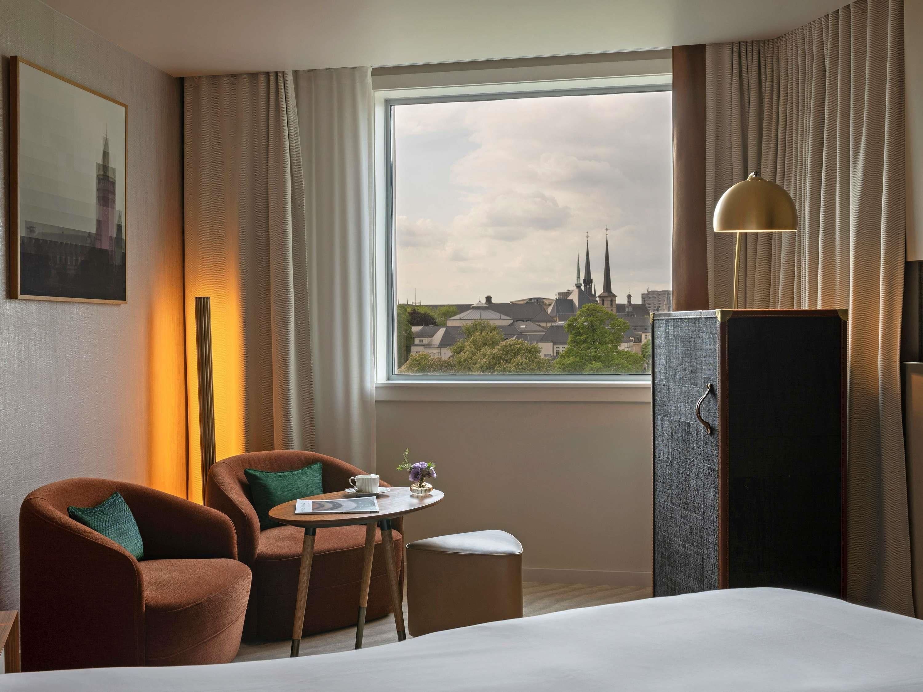 Premium bedding, memory foam beds, minibar (some free items)
