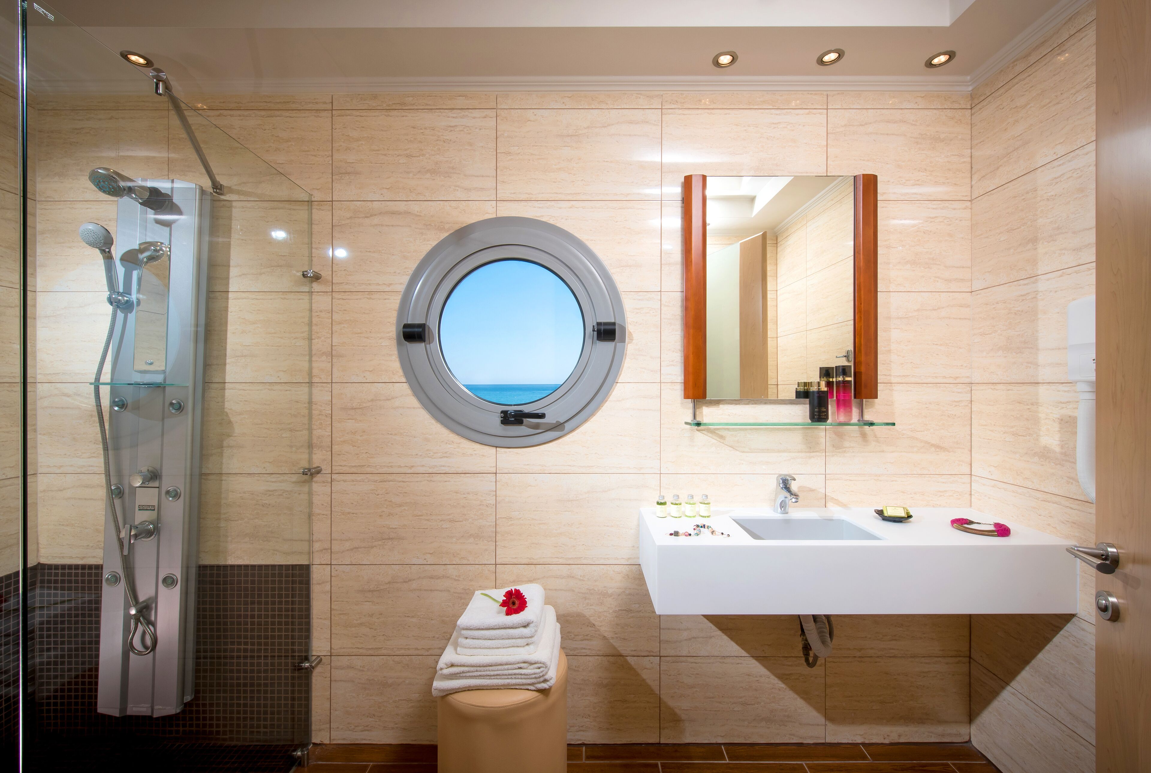 junior suite | bathroom | shower, rainfall showerhead, designer toiletries, hair dryer
