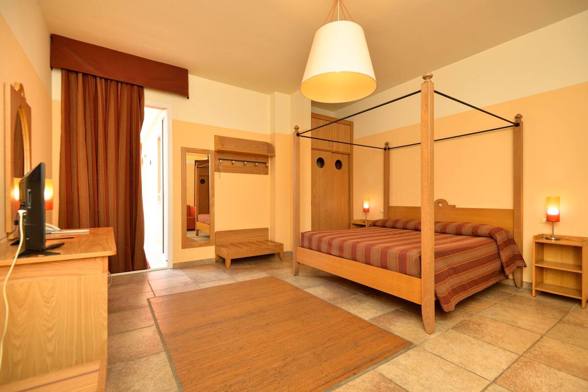 superior triple room | minibar, desk, blackout curtains, soundproofing