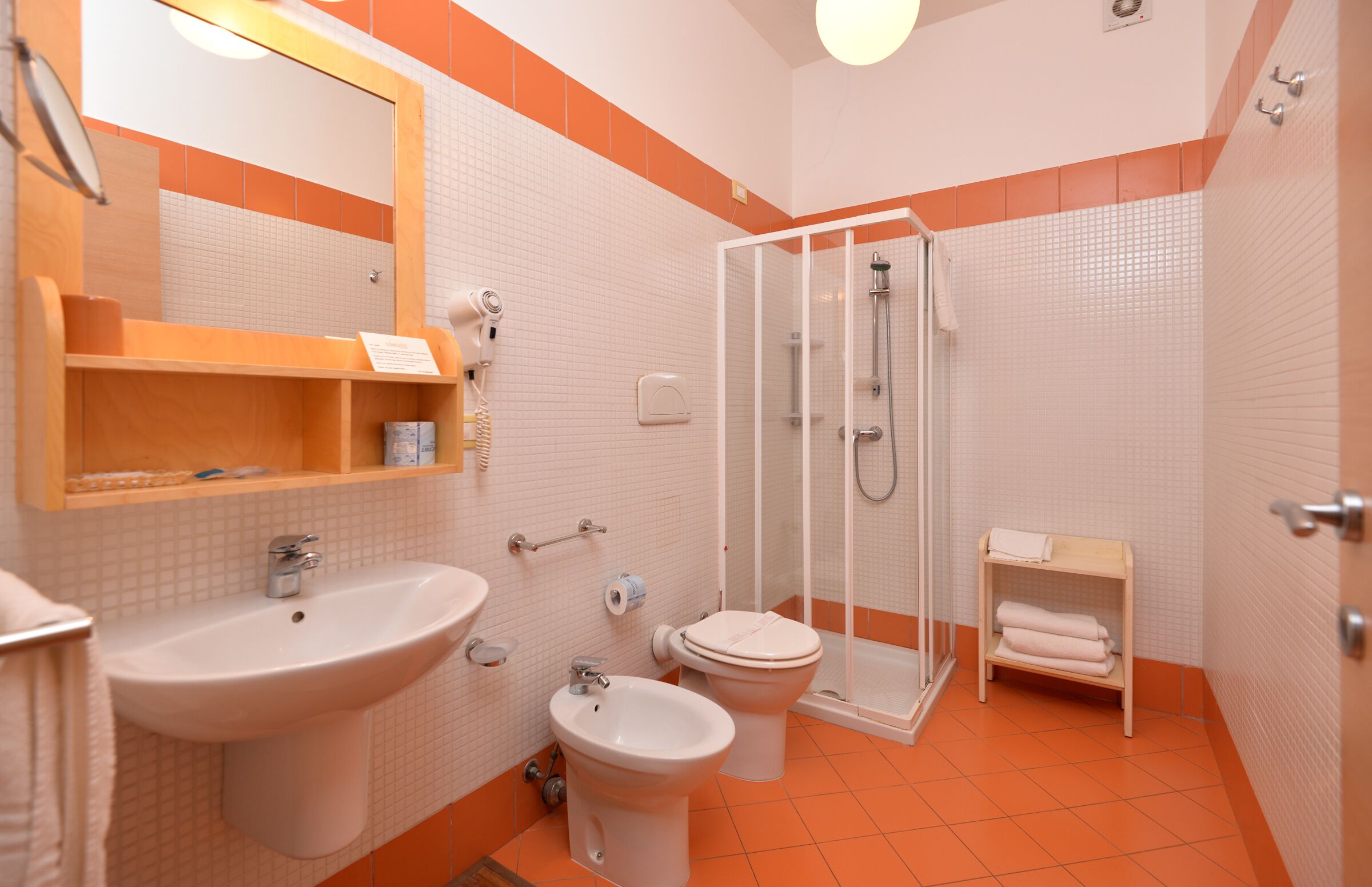 superior triple room | bathroom | free toiletries, hair dryer, bidet, towels