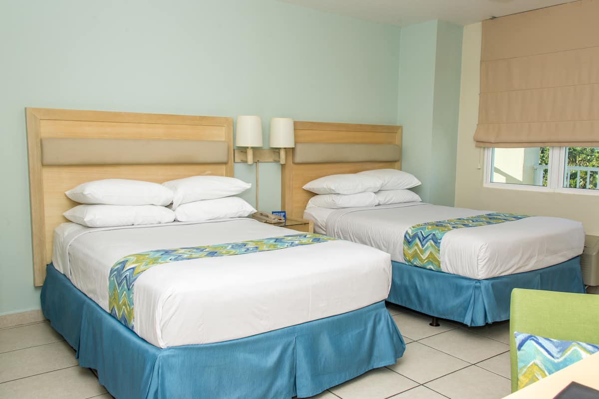 studio suite | in-room safe, desk, blackout curtains, iron/ironing board