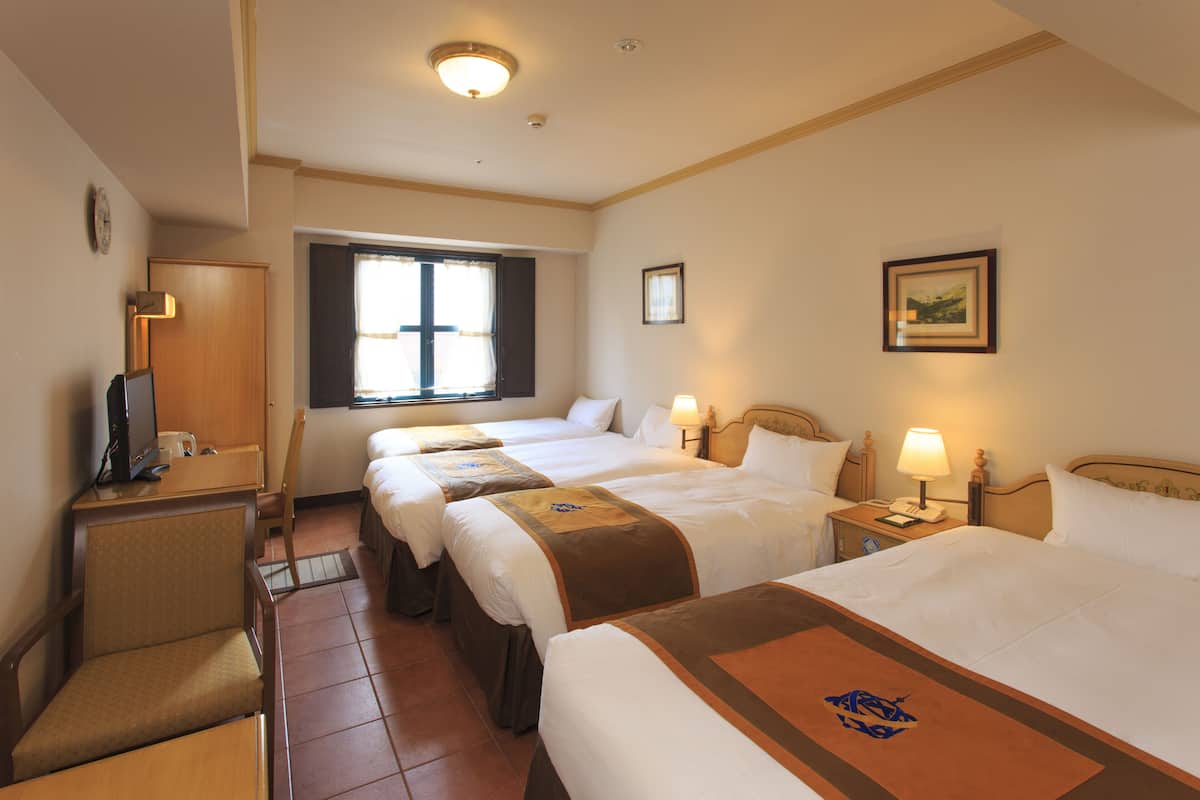 Family Quadruple Room, 4 Bedrooms, Non Smoking | In-room safe, desk, soundproofing, free WiFi