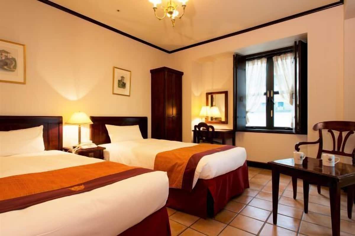 Premium bedding, desk, iron/ironing board (on request), WiFi (free)