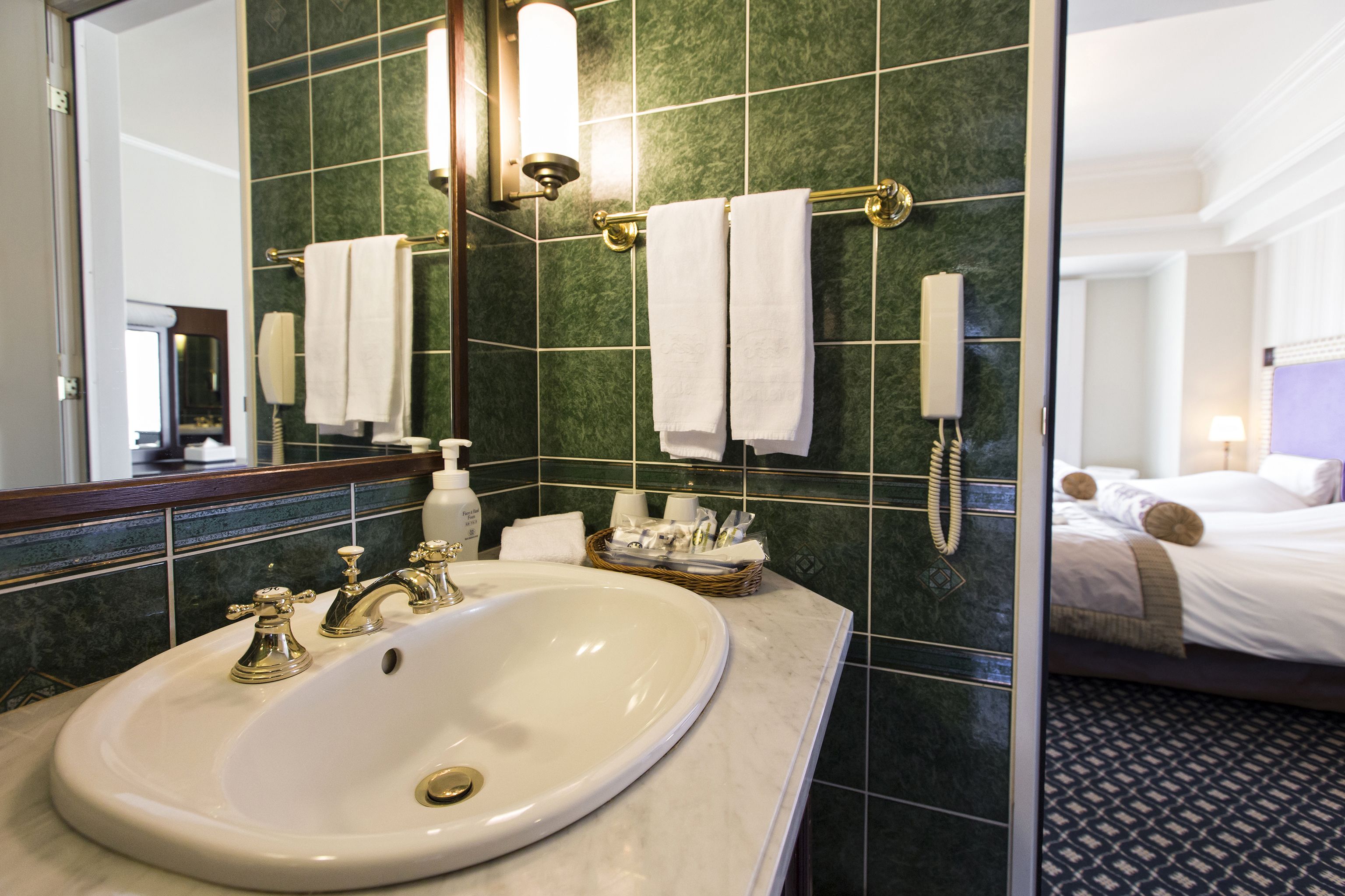 luxury room (2 single sized beds) | bathroom sink