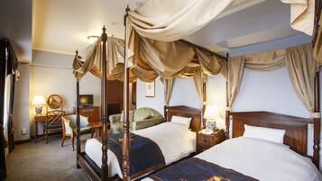 Premium bedding, down duvets, in-room safe, desk