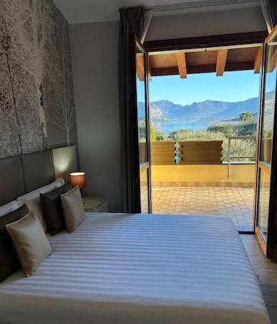 Biancheria da letto di alta qualità, minibar, una cassaforte in camera. Hotel Ulivi