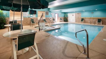 Indoor pool, pool umbrellas, sun loungers