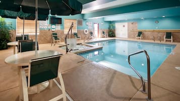 Indoor pool, pool umbrellas, pool loungers