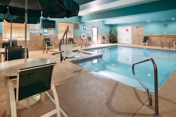 Indoor pool, pool umbrellas, sun loungers