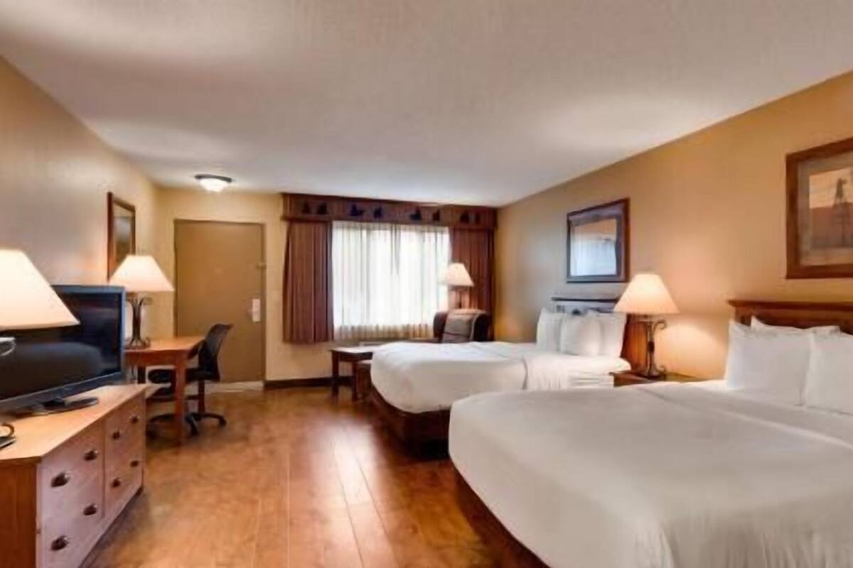 Pillow-top beds, desk, laptop workspace, blackout curtains