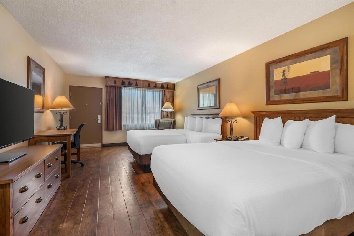 Pillow-top beds, desk, laptop workspace, blackout curtains