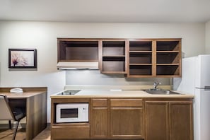 Full-size fridge, microwave, stovetop
